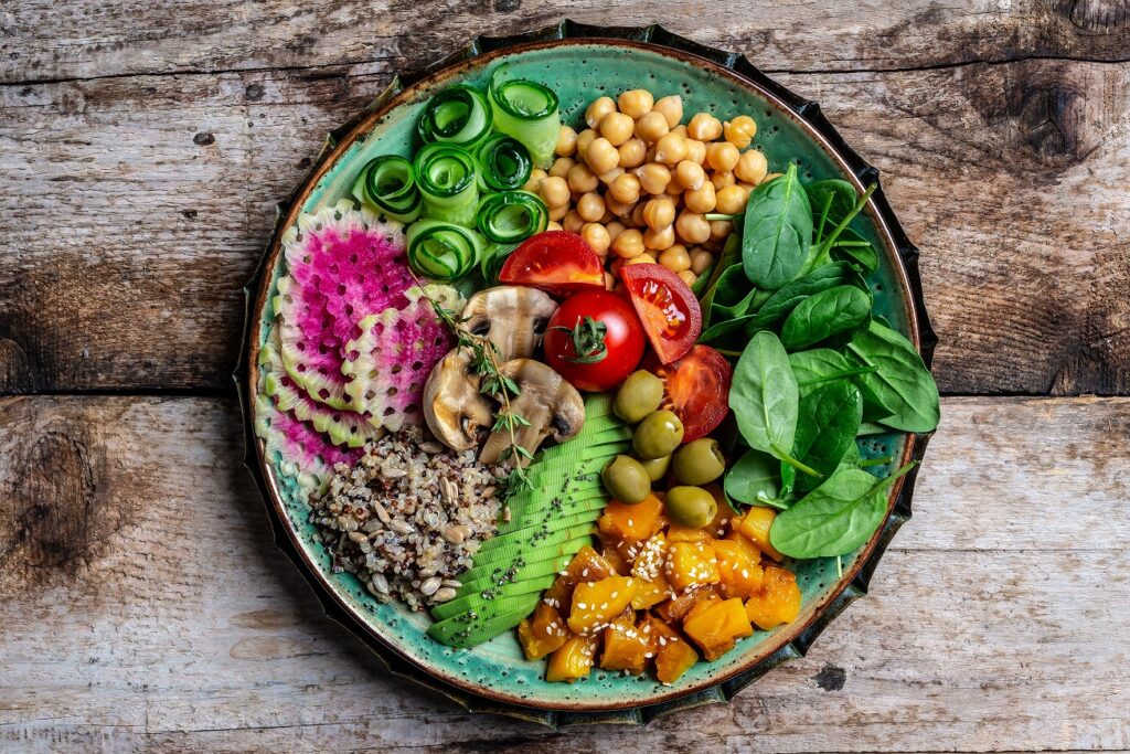 Buddha Bowl With Quinoa, Avocado, Mushrooms, Cucumber, Chickpeas